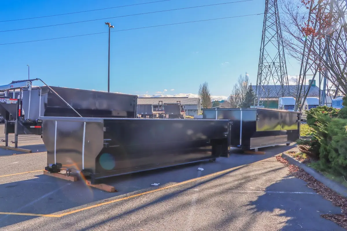 Roll-off dumpster ready for waste disposal at job site for Yard Waste Dumpster Rental in Bellevue
